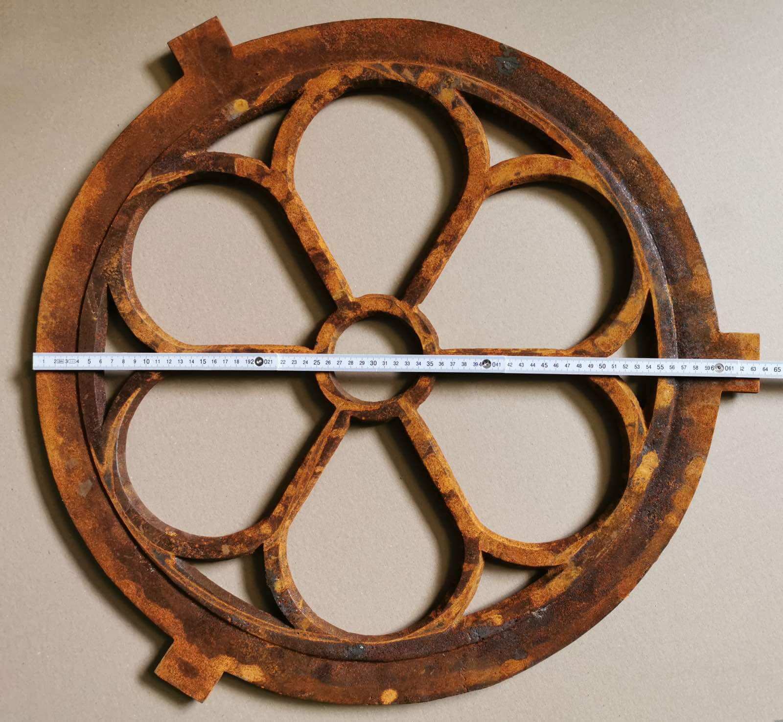 Window frame in an antique style - circular cast iron with rust - round